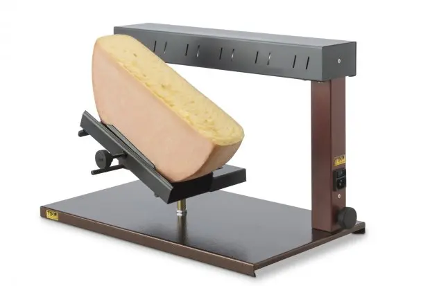 Appareil à raclette traditionnel pour une demi–meule